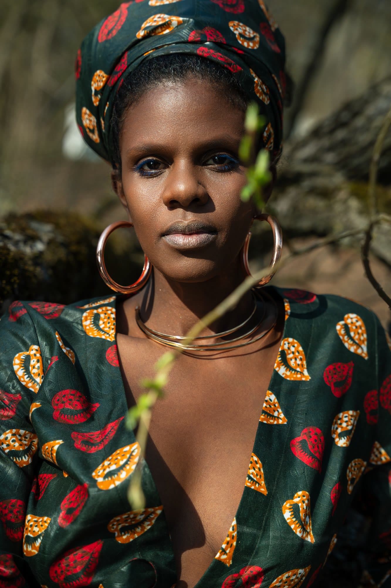Portrait in a printed headwrap