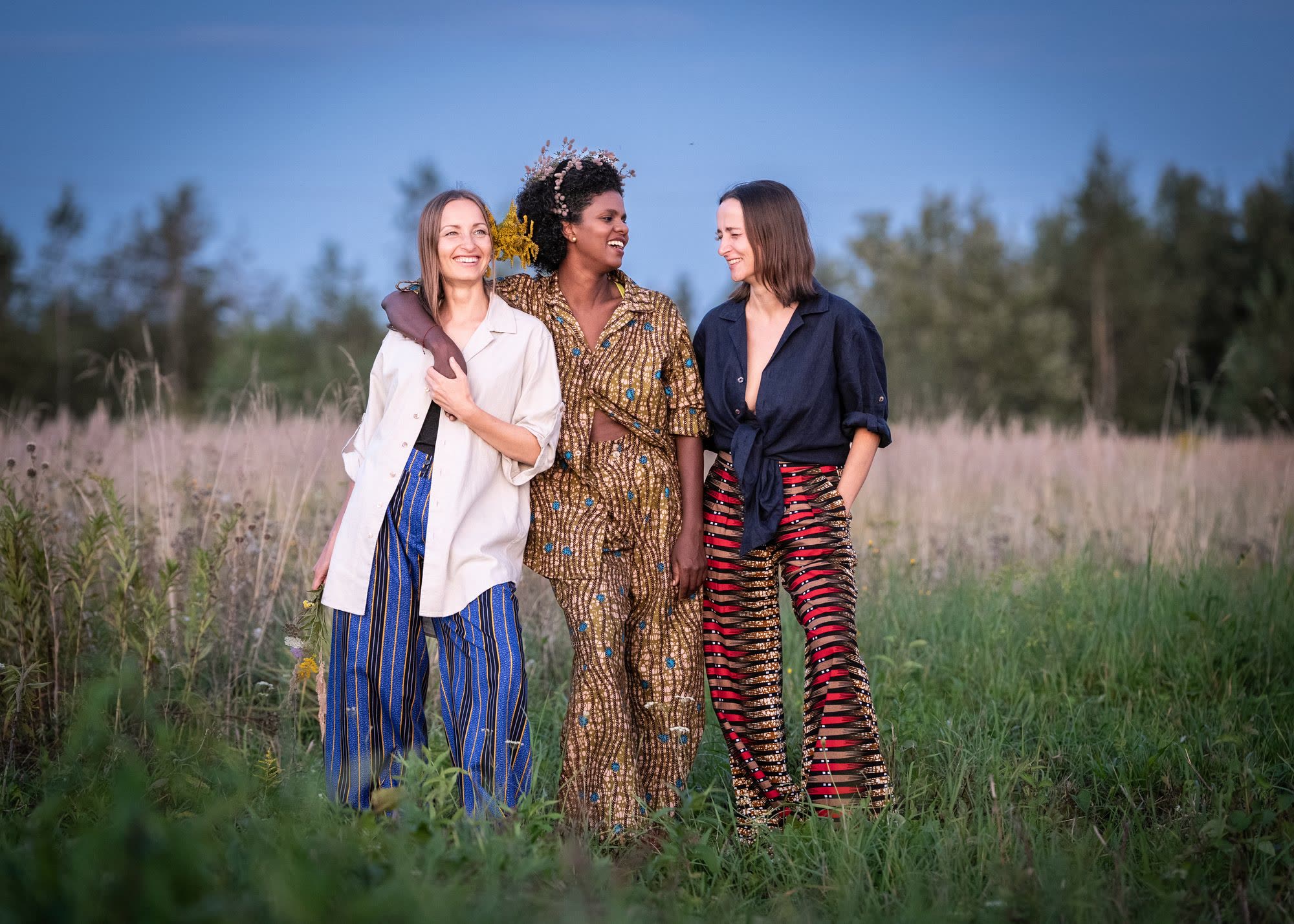 Three figures in a field
